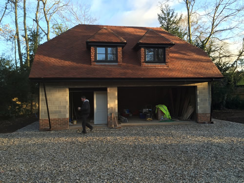 triple garage and apartment